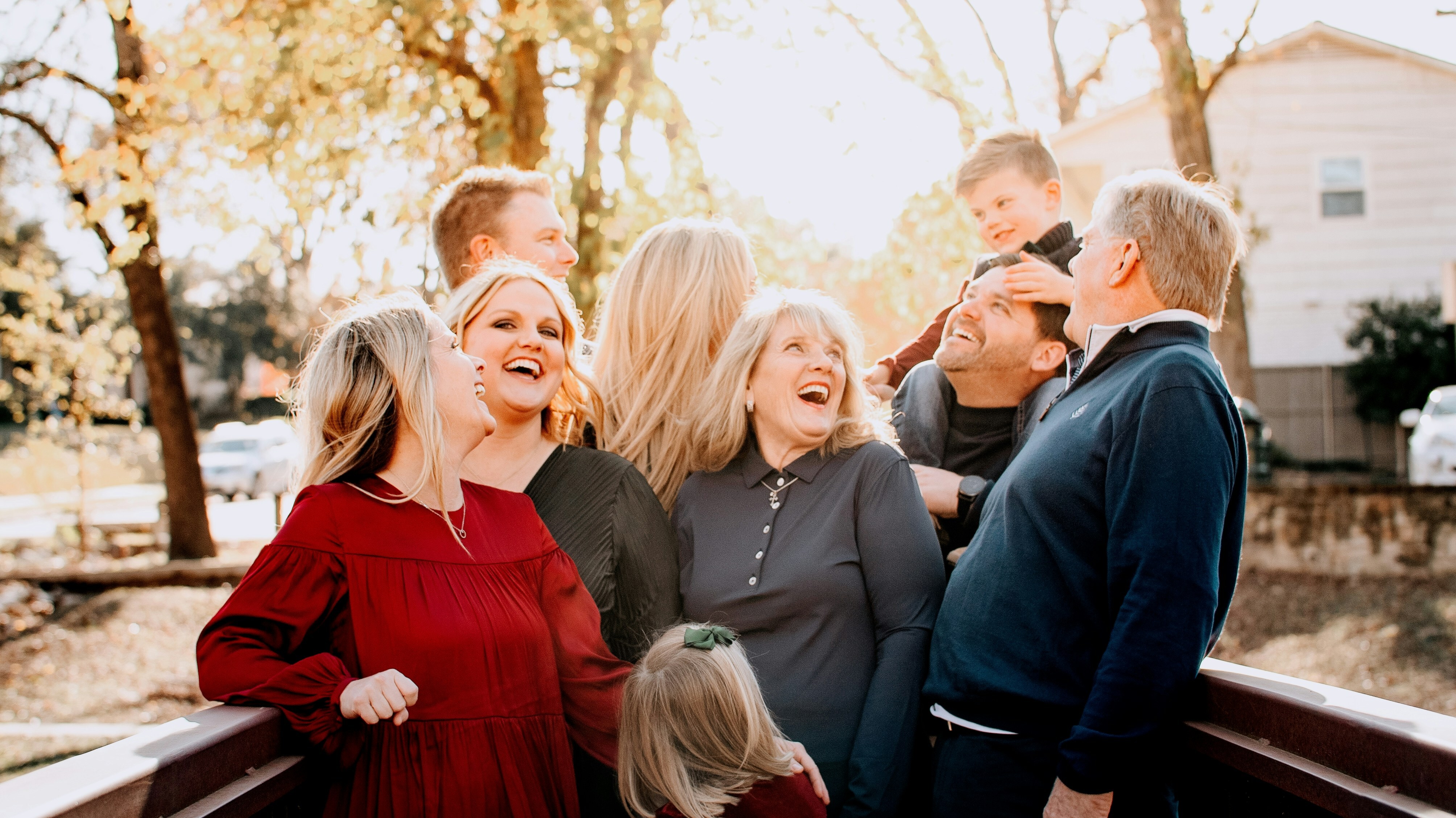Extended family sharing a joyful moment together outdoors
